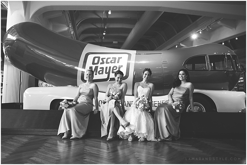 Bride and Bridesmaids in front of the wiener mobile at the Henry Ford Museum