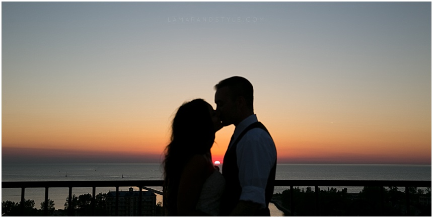 sunset at the veranda with bride and groom