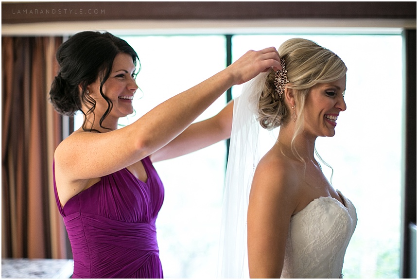 Bride getting ready with veil at Atheneum suites hotel in Detroit